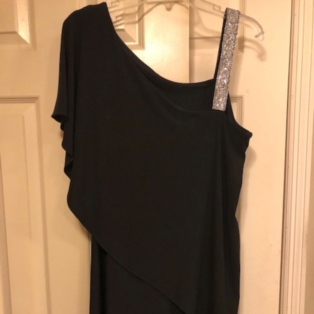 One sleeve Black shift cocktail dress with embellished strap. Great for parties!
